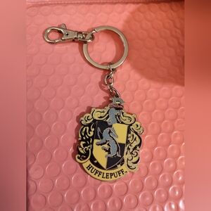 Universal Studios Wizarding World of Harry Potter Hufflepuff Crest Keychain